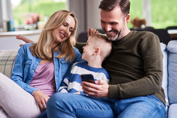 Happy family spending time together at home