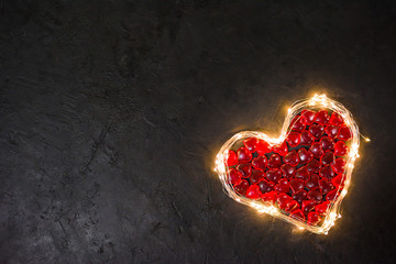 Valentine's day-heart on dark background, place for text, postcard for holiday