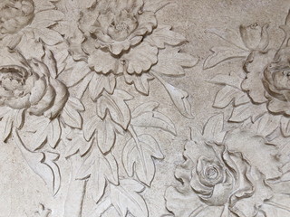 Low relief cement Thai style handcraft of rose flower