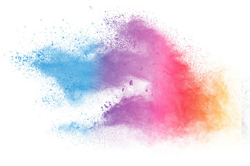 Multicolor powder explosion on white background.