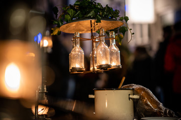 Fototapeta na wymiar Decorative stylized vintage lamp above a table