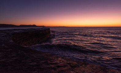 Magenta sunrise over The Cobb