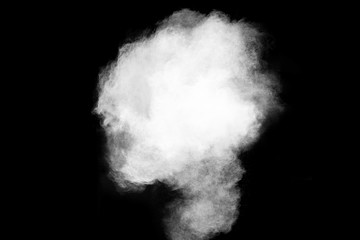 White powder explosion on black background.