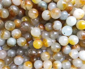 Close up small colorful beads background.