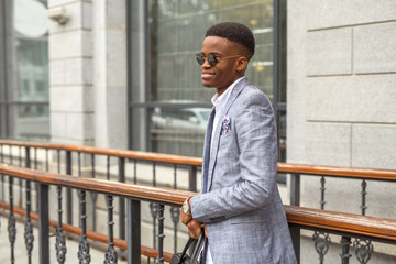 handsome young african man in a suit