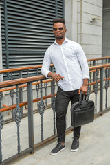 handsome young african man in a white shirt