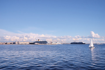 Quayside with huge ferry boats in the docks at Neva river. Petersburg, Russia.