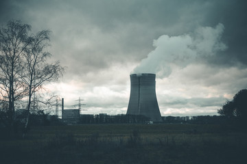 Nuclear Power Plant on the Field with Gray Clouds