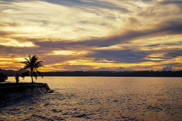 Fototapeta na wymiar Beautiful sunset on tropical island.