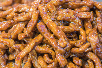 Fried Pork with juicy sauce in the local street food market of Thailand