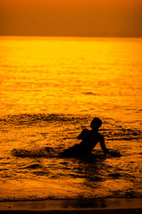 silhouette of a man on the beach