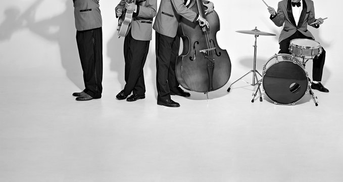 Jazz band players on white. Vintage music background