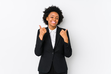 Middle aged african american business  woman against a white background isolated raising both thumbs up, smiling and confident.