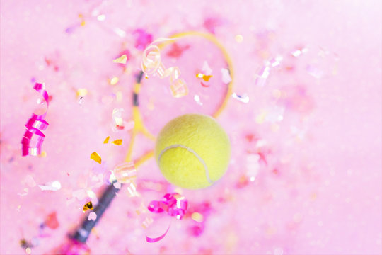 yellow tennis ball on pink background flying tennis sport party concept