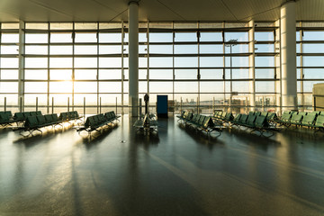 Chairs in modern airport terminal