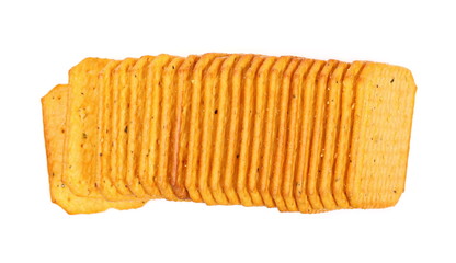 Salty crackers, snacks pile isolated on white background, top view
