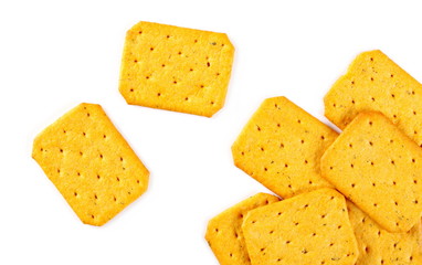 Salty crackers, snacks pile isolated on white background, top view