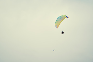Paraplane on the blue sky background, leisure activity.