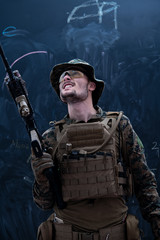 soldier potrait closeup in front of black chalkboard