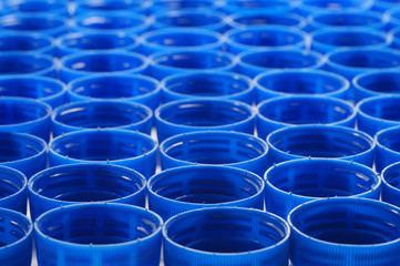 Bottle caps made of HDPE (high-density polyethylene) - Recyclable material. Segregated according to...