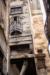Fototapeta premium Old facade and window of an ancient building in the medina of Fes el Bali in Morocco