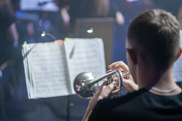 Man playing trumpet at the concert