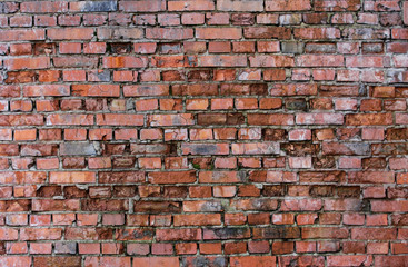 Old red brick damaged wall full frame background