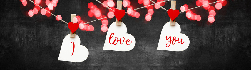 	 I love you, Valentine's Day background banner panorama - White heart hang on wooden clothes pegs...