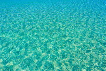 Orange Bay Beach with crystal clear azure water and white beach - paradise coastline of Giftun island, Mahmya, Hurghada, Red Sea, Egypt.