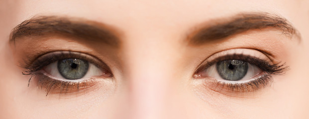eyes of a fair-skinned girl with make-up closeup