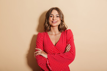 Beautiful young woman wearing red summer dress