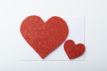 postcard with red hearts on white background for Valentine's day