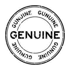 Grunge black genuine word round rubber seal stamp on white background