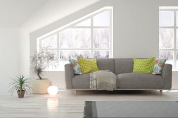 Stylish room in white color with sofa and winter landscape in window. Scandinavian interior design. 3D illustration