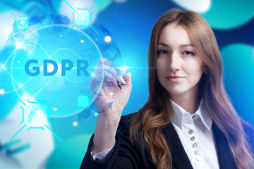 Business, Technology, Internet and network concept. Young businessman working on a virtual screen of the future and sees the inscription: GDPR