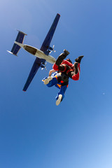 Tandem jump. The instructor and the student in free fall.