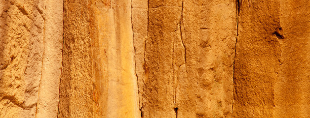 Image of ancient prehistoric stone wall texture background. Horizontal image.