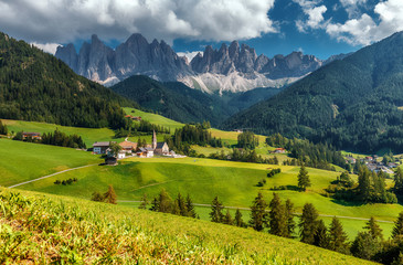 Wonderful Sunny Landscape of Dolomite Alps. Countryside view of the St. Magdalena or Santa...