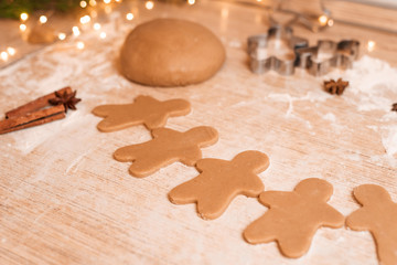 Gingerbread man cookies for Christmas holiday. the process of making ginger cookies
