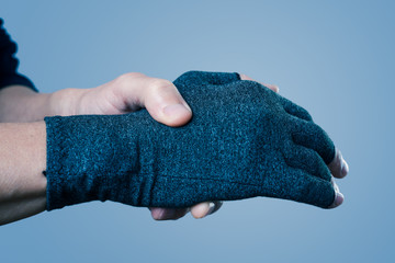 man wearing a compression glove