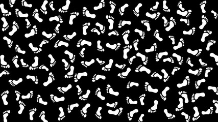White foot prints on black background