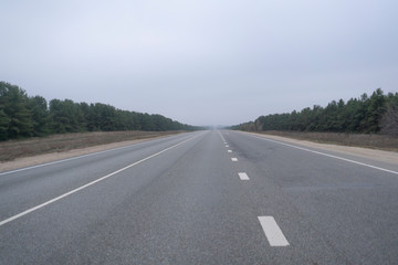 the abstract highway road in countryside in the fog rainy weather. danger driving, accident car crash