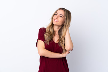 Young woman over isolated white background thinking an idea