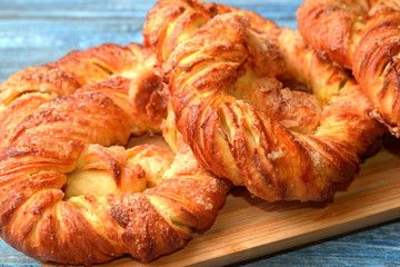 Fresh pastries bakery products, on wooden table