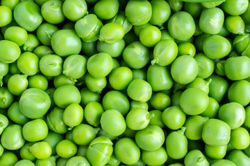 Background of fresh natural organic vegetable food - green peas