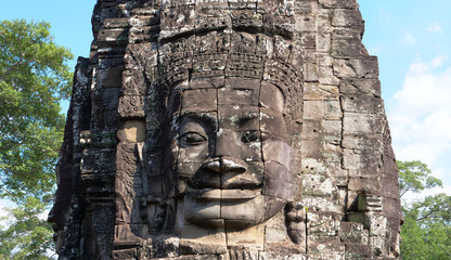 Fototapeta na wymiar Face tower at the Bayon Temple in Angkor wat complex, Siem Reap Cambodia