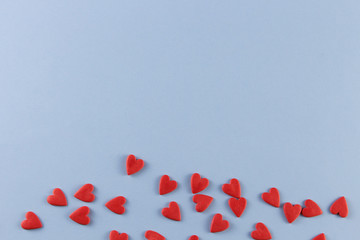 red hearts on a white background with place for text.