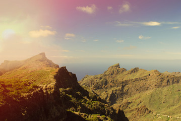 Rising sun with mountains photos