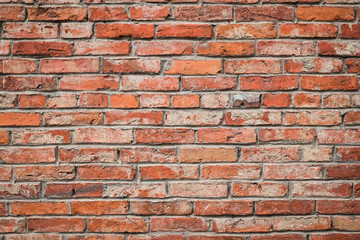 Countryside brick style old house orange wall.