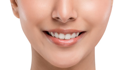 Close up part of the face. The perfect align teeth of young Caucasian teenager woman with smiley...
